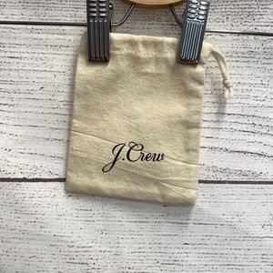 Small cream cloth J. Crew cloth jewelry dust bag 4" x 5"